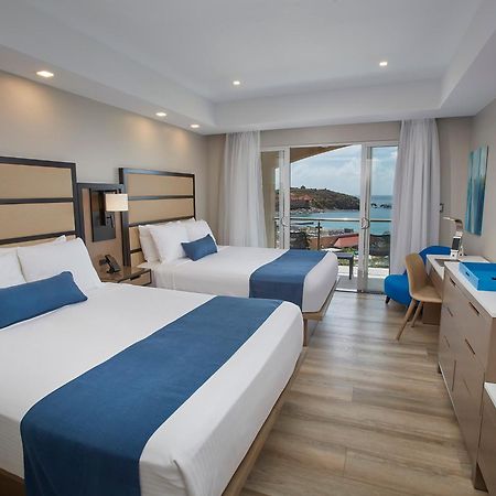 Oceans At Divi Little Bay Hotel Exterior photo